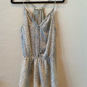 Blue and white romper with geometric design